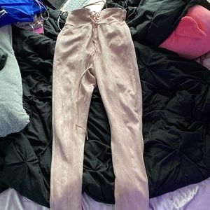 I’m selling a pink suede pants.